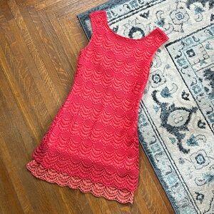 Coral and peach lace cocktail dress by Bebe